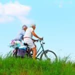 senior couple riding bicycles